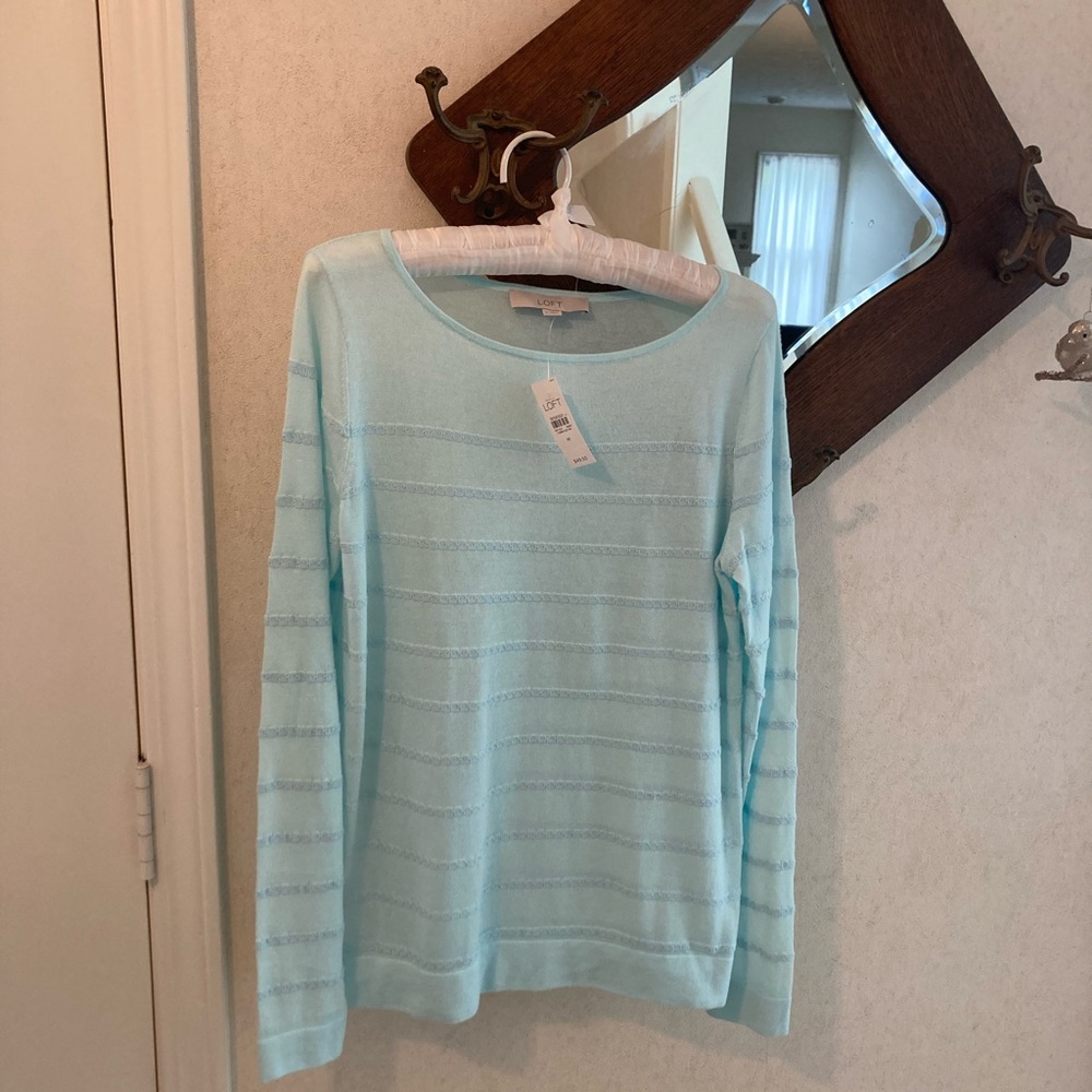 New with tags! Light weight pullover sweater.